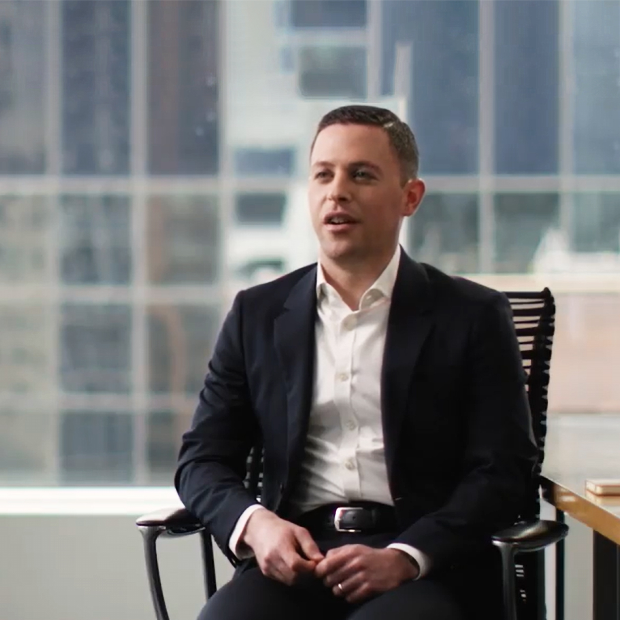 Employee in Chair Speaking